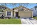 Charming one-story house with a two-car garage at 2524 Dover Glen Cir, Orlando, FL 32828