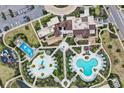 Resort-style community with pools, playground, and clubhouse at 2009 Tropical Palms Cir, Kissimmee, FL 34747