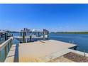 Private boat dock with lift and plenty of space for water activities at 1112 N Peninsula Ave, New Smyrna Beach, FL 32169