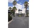 View of Maitland Harbour building entrance and landscaping at 1000 S Orlando Ave # A5, Maitland, FL 32751