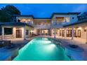 Expansive backyard with a large pool and fire features at 16716 Artimino Loop, Montverde, FL 34756