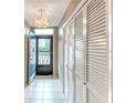 Condo entryway with tiled floor and built-in storage at 700 Melrose Ave # E4, Winter Park, FL 32789