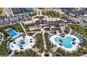 Community amenities include pools, playground, and clubhouse at 2178 Cooper Bell Pl, Kissimmee, FL 34747