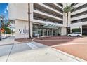 The Vue at Lake Eola building entrance with modern glass doors at 150 E Robinson St # 1709, Orlando, FL 32801