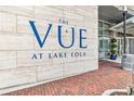 The Vue at Lake Eola building entrance with brick pathway at 150 E Robinson St # 1709, Orlando, FL 32801