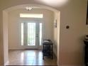 Bright entryway with tile flooring and access to other rooms at 4739 Spring Grove Ln, Leesburg, Fl, FL 34748