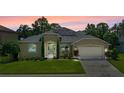 Beautiful house exterior with landscaping at 2855 Gopherwood Way, Clermont, FL 34711