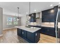Open concept kitchen with large island and breakfast bar at 2149 Divot Dr, Daytona Beach, FL 32124