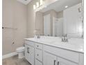 Modern bathroom with double vanity, quartz countertop, and chrome fixtures at 3116 Legends Preserve Dr, Daytona Beach, FL 32124