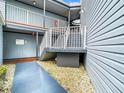 Exterior walkway and stairs between buildings at 3937 Atrium Dr # 5, Orlando, FL 32822