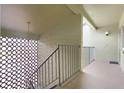 Stairwell with an open-air design and access to the outside at 8 Escondido Cir # 78, Altamonte Springs, FL 32701