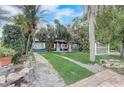 Home exterior with a walkway and landscaping at 2144 Ridge Dr, Winter Park, FL 32792