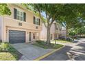 Two story townhome with neutral color scheme and attached garage at 2748 Clinton Heights Ct, Oviedo, FL 32765