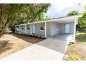 Newly renovated home exterior with covered porch and driveway at 805 Lockhart St, Daytona Beach, FL 32114