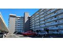 Modern building exterior with ample parking at 101 N Riverside Dr # 4100, New Smyrna Beach, FL 32168