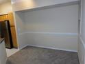 Bright dining area with neutral colored walls and carpet at 3480 Soho St # 101, Orlando, FL 32835