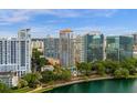 High-rise building with water views and nearby city buildings at 322 E Central Blvd # 710, Orlando, FL 32801