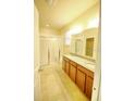 Double vanity bathroom with shower and tub at 16253 Pebble Bluff Loop, Winter Garden, FL 34787