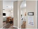 View of dining area and kitchen with access to living room at 8100 Princess Palm Ln # 201, Kissimmee, FL 34747