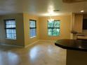 Bright dining area with tile floors and large windows at 200 Afton Sq # 102, Altamonte Springs, FL 32714