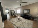 Elegant living room with modern furniture at 7416 Soiree Way, Reunion, FL 34747