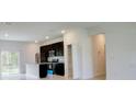 Modern kitchen with stainless steel appliances and an island at 6952 Sw 152Nd St, Ocala, FL 34473