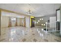 Living room with tiled floors and a chandelier at 2303 Bonneville Dr, Orlando, FL 32826