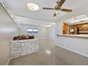 Dining room with a built-in planter and ceiling fan at 2303 Bonneville Dr, Orlando, FL 32826