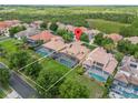 Aerial view of house and surrounding neighborhood at 334 Chadwick Dr, Davenport, FL 33837