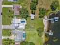 Property featuring pool, dock and lake access at 7220 Grace Rd, Orlando, FL 32819