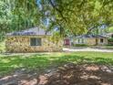Ranch style home with stone exterior at 3355 Scarlet Dr, Sanford, FL 32773