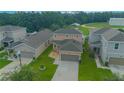 Aerial view of two-story house and neighborhood at 1146 Atlantic Ave, Fruitland Park, FL 34731