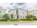 Modern two-story home with landscaping at 4562 Narrative Ln, Kissimmee, FL 34746