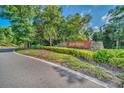Arden Park community entrance with lush landscaping and signage at 2854 Black Birch Dr, Ocoee, FL 34761