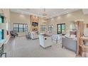 Community clubhouse with comfortable seating and fireplace at 2854 Black Birch Dr, Ocoee, FL 34761