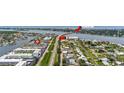 Aerial view showcasing home's location near the water and Flagler Ave at 335 N Causeway # B010, New Smyrna Beach, FL 32169