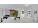 Spacious living room with access to a private balcony at 1150 Carmel Cir # 408, Casselberry, FL 32707