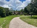 Luxury home with circular driveway and lush landscaping at 3364 Sterling Ln, Orlando, FL 32817