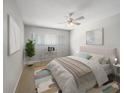 Comfortable bedroom with ceiling fan, neutral decor, and ample space for furniture at 360 Golfside Cv # 360, Longwood, FL 32779