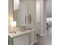 Bright entryway with mirror and contemporary console table at 1505 Carey Palm Cir, Kissimmee, FL 34747