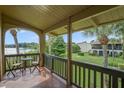 Relaxing lanai with lake views and patio furniture at 200 Maitland Ave # 2, Altamonte Springs, FL 32701