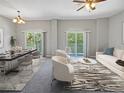 Open living and dining area with access to a balcony at 10888 Eclipse Lily Way # 62A, Orlando, FL 32832