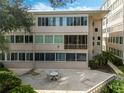 Building exterior with patio furniture and landscaping at 311 E Morse Blvd # 7-2, Winter Park, FL 32789