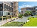 Landscaped grounds with a serene water feature at 311 E Morse Blvd # 7-2, Winter Park, FL 32789