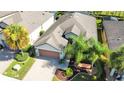 One-story house with attached garage and well-maintained landscaping at 333 Navarra Ln, Davenport, FL 33837