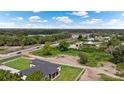 Aerial view of home, showcasing location near a road at 530 Boggy Creek Rd # 3429, Kissimmee, FL 34744