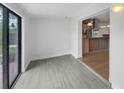 Sunroom with tile flooring and access to the backyard at 171 Ronnie Dr, Altamonte Springs, FL 32714