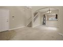 Bright and spacious living room with high ceilings and ample natural light at 889 Park Grove Ct, Orlando, FL 32828