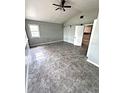 Spacious bedroom with tile floors and ceiling fan at 520 Avenue L Se, Winter Haven, FL 33880