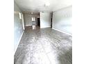 Bright living room with tile floors and lots of natural light at 520 Avenue L Se, Winter Haven, FL 33880
